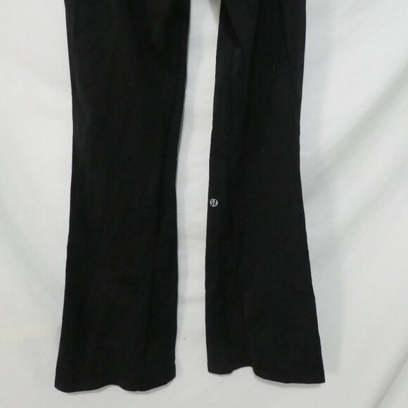 LULULEMON ATHLETICA | 4 regular | Black Flared Leggings - Picture 14 of 16